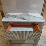 Marble-Top Sideboard Cabinet with Five Fluted Drawers, Rounded Light Wood Veneer Frame, and Brass Accent Details
